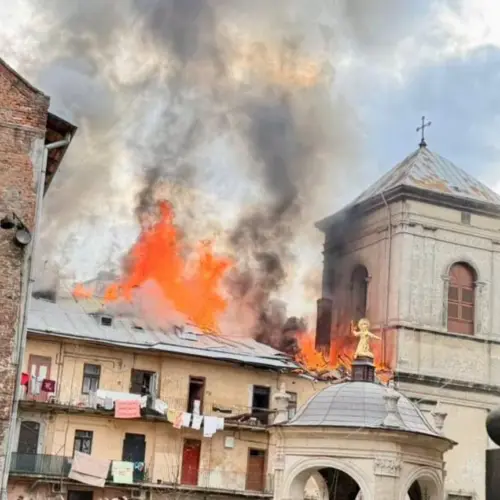 Lviv officials posted images of a residential building on fire next to the Bernardine monastery. (Andriy Sadovyi/Telegram)