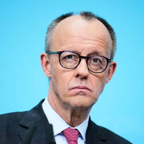 Friedrich Merz, looking concerned into a camera