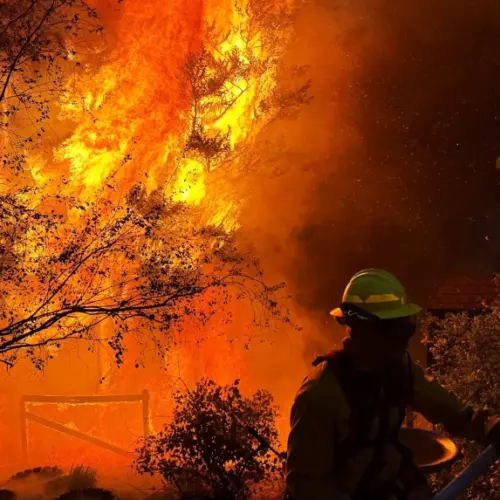 A wildland firefighter battling the Spokane, WA blazes
